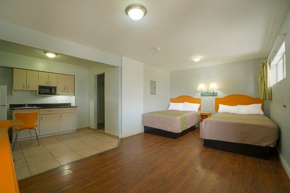 Photo 1 of 15 of 1 King and 2 Full Beds with Kitchenette Non-Smoking