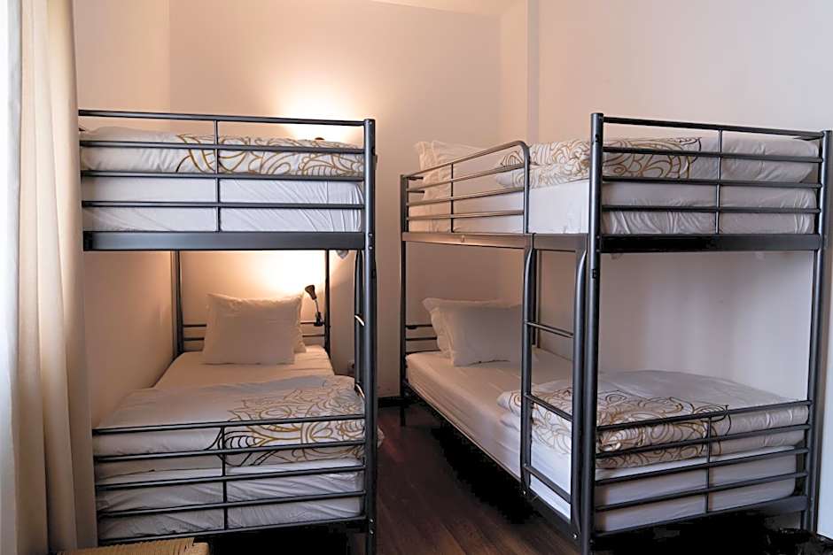 Photo 1 sur 4 de Bed in 4-Bed Mixed Dormitory Room