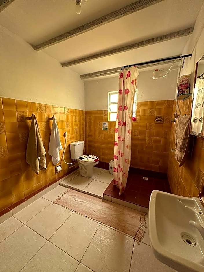 Quarto à 500m da praia Espaco Aconchego do Gugu