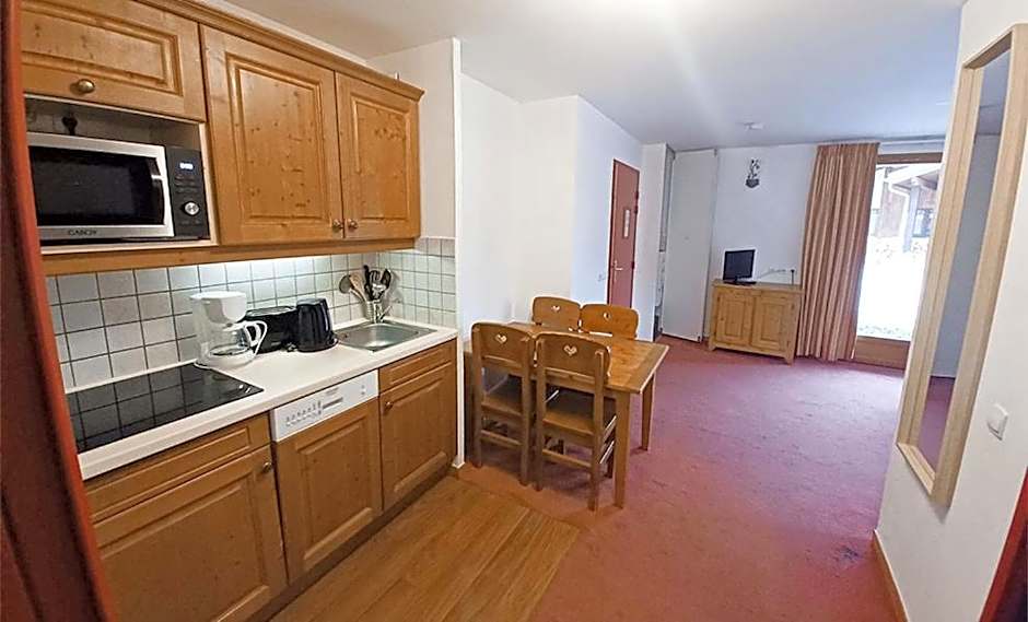 Vacancéole - Résidence Les Chalets de la Ramoure