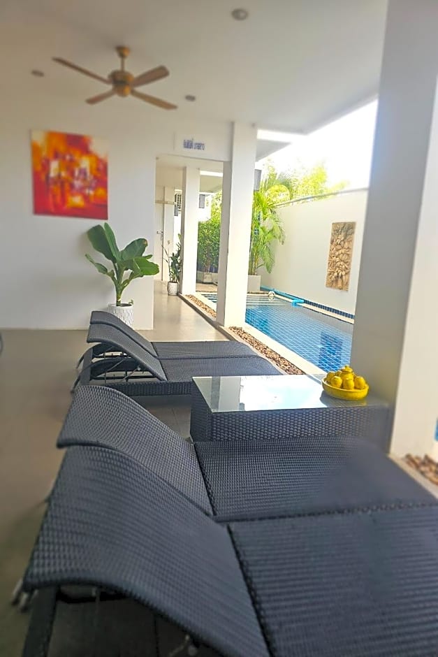 One World One Home Naiharn Hotel