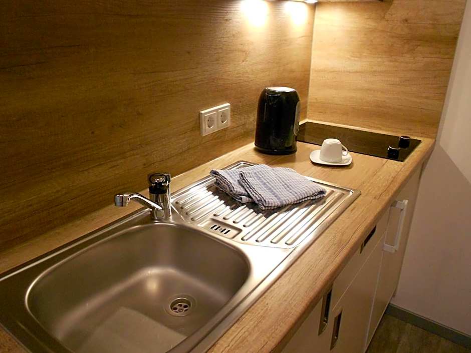 Hotel M24 - Alle Zimmer mit Küchenzeile