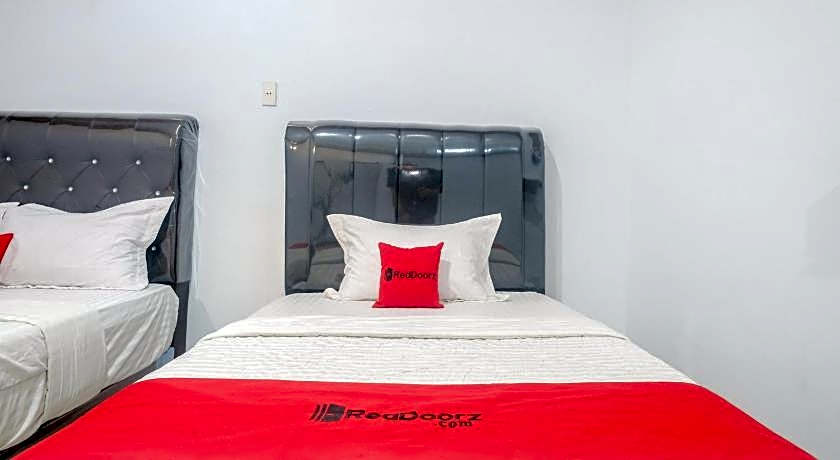 RedDoorz @ MG House Siantar Timur
