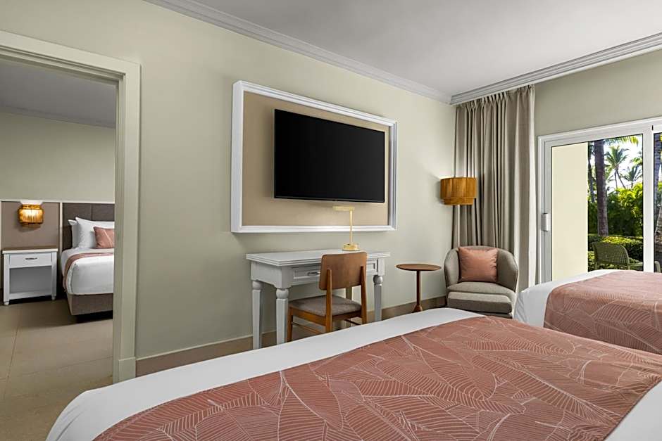 Photo 1 of 4 of Club Family Junior Suite with One King Bed, Two Queen Beds and Tropical View