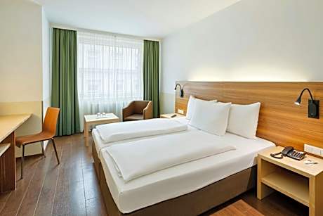 Family Room with Two Twin Beds and Courtyard View