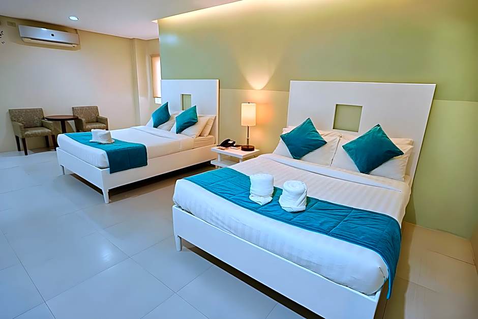 Holiday Suites Business District - Formerly Empire Suites Hotel