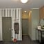 Happy Inn Rooms & Suites