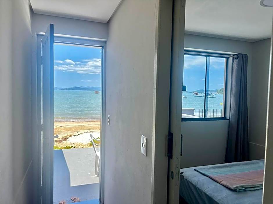 Pé na areia! Aconchegante casa frente Mar! CO02I