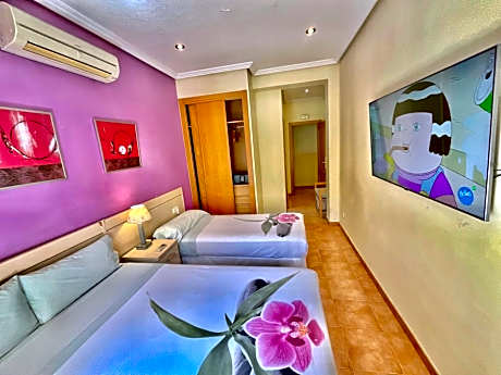 Triple Room (2 Adults + 1 Child)