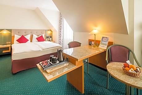 Comfort Quadruple Room with Queen Bed and Sofa Bed
