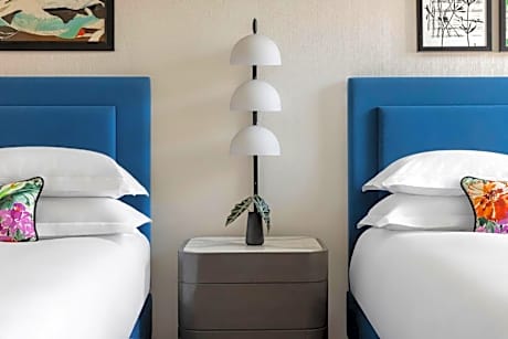 Essential Queen Room with Two Queen Beds and City View