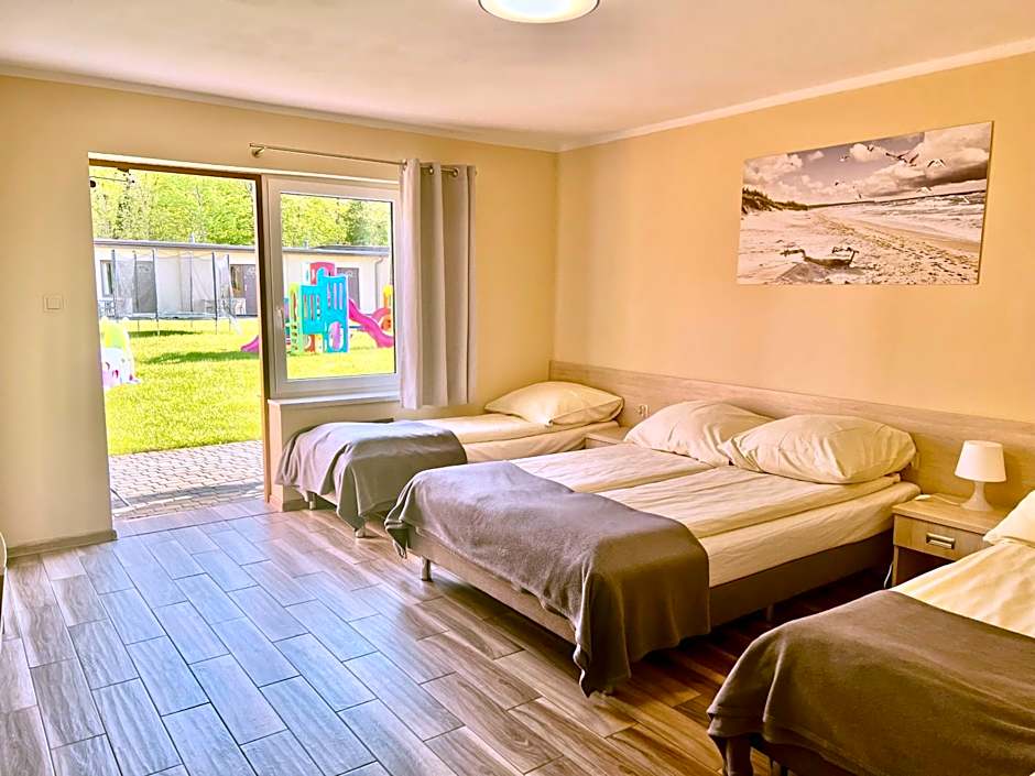 Pokoje do wynajęcia "Pod Wydmami" Sarbinowo PRZY PLAŻY , PLAC ZABAW , ROWERY