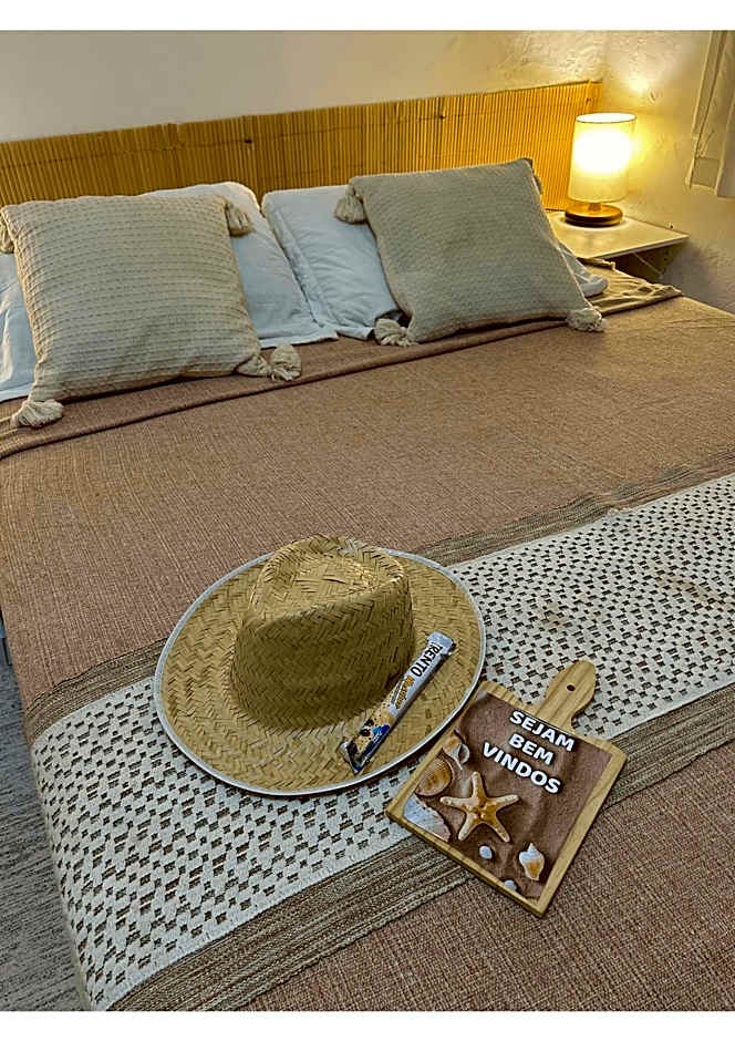 Casa Ilha| beira mar, piscina aquecida, 4 suítes