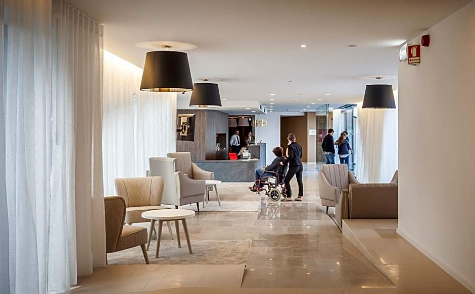 Essence Inn Marianos Hotel