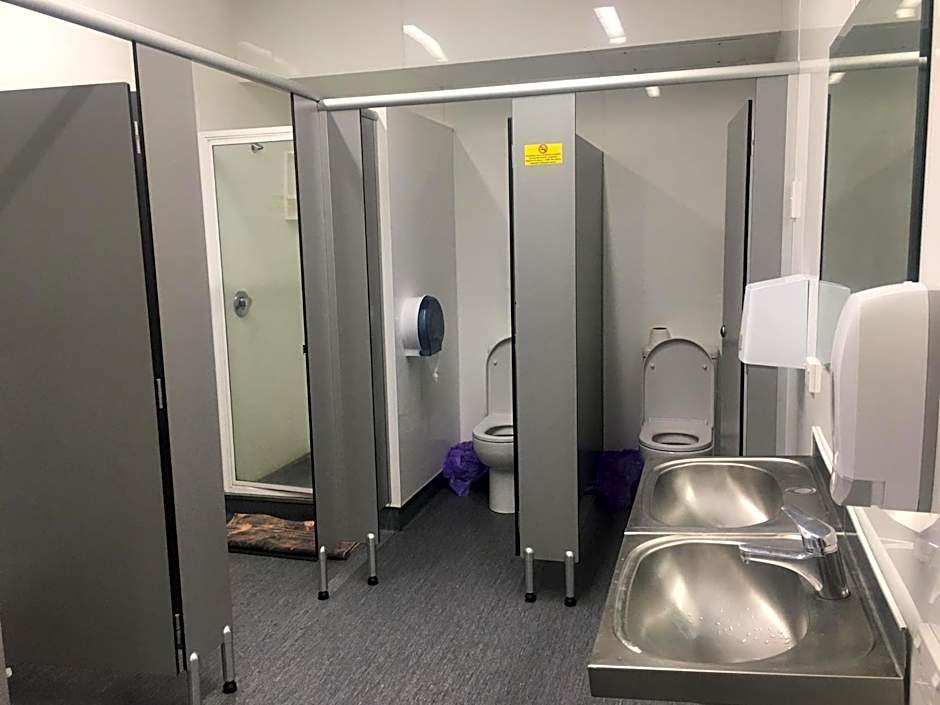 Surf 'N' Snow Backpackers Across Sky Tower