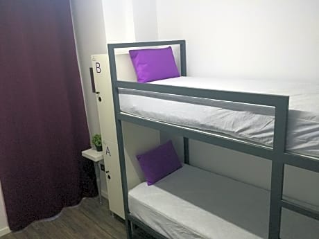 Bed in 4-Bed Female Dormitory Room with External Bathroom