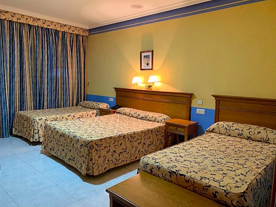 Photo 1 of 5 of Triple Room (2 Adults + 1 Child)