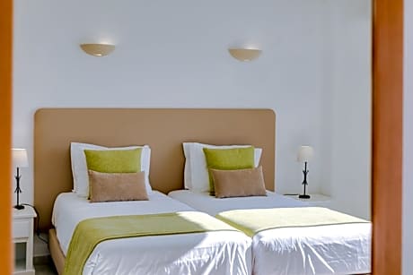 Double or Twin Room (2 Adults + 1 Child)