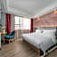 Borrman Hotel (Guangzhou Xinshi Baixin Plaza Qifu Road Branch)