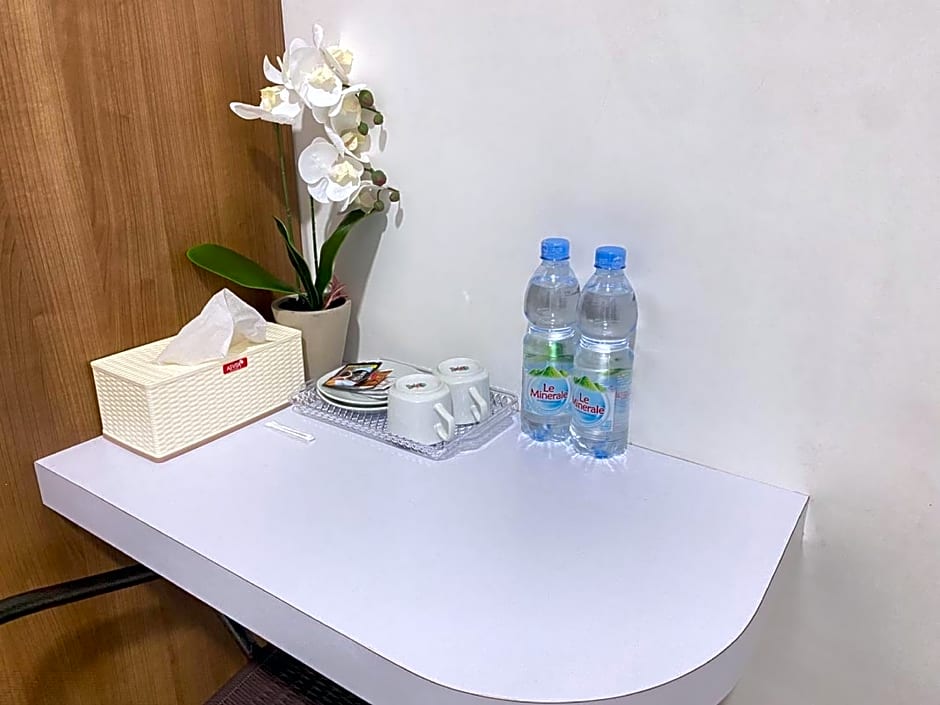 MJ Guest House Pusat Kota Malili Mitra RedDoorz