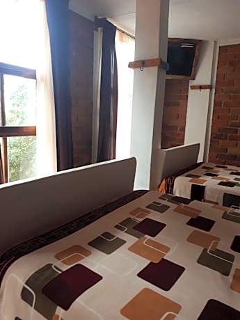 Quadruple Room with Private Bathroom