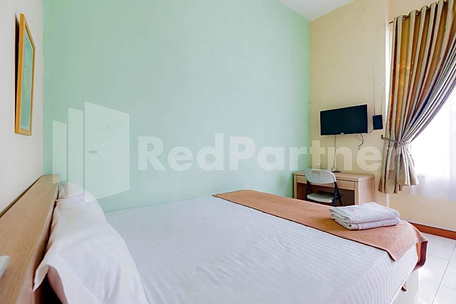 Wisma Anggrek Syariah Mitra Reddoorz