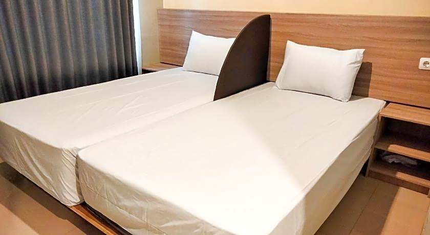 Wikost Premiere Inn mitra RedDoorz