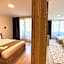 Rena Grand Residence & Suit