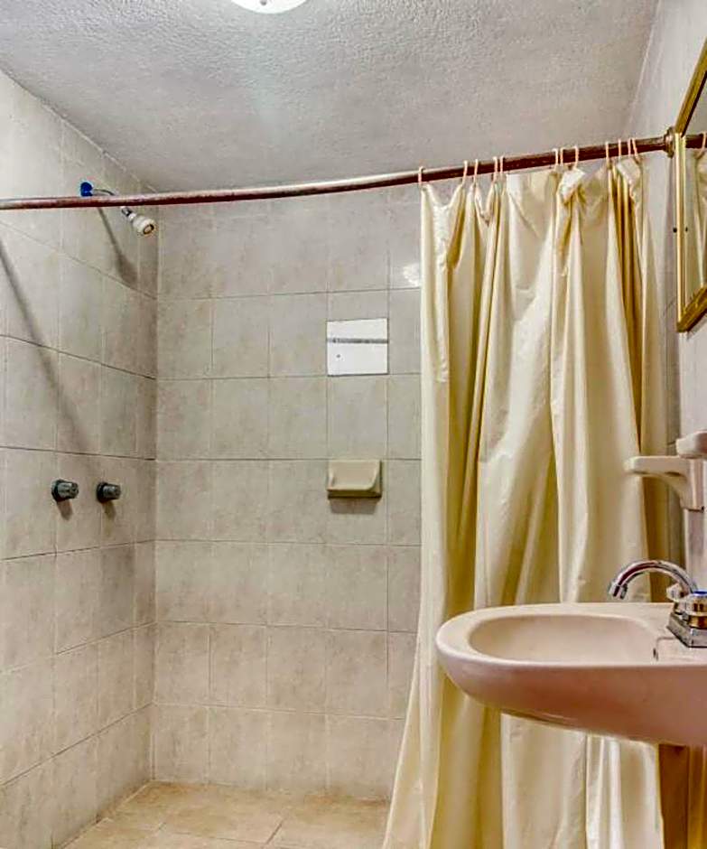 Capital O Hotel La Siesta