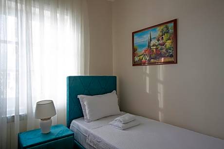 Three-Bedroom Premium Apartment with Balcony