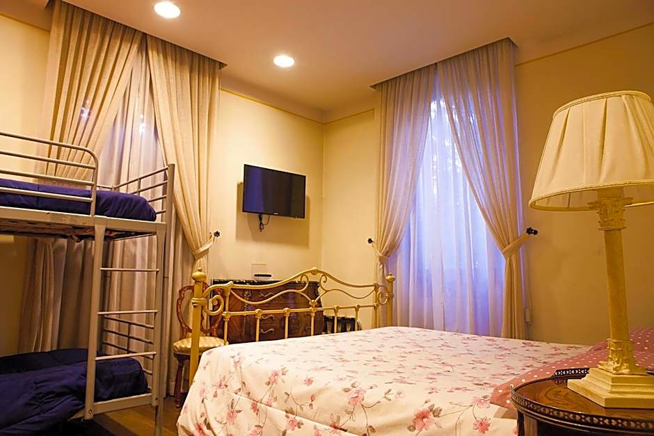 Photo 1 of 13 of Quadruple Room