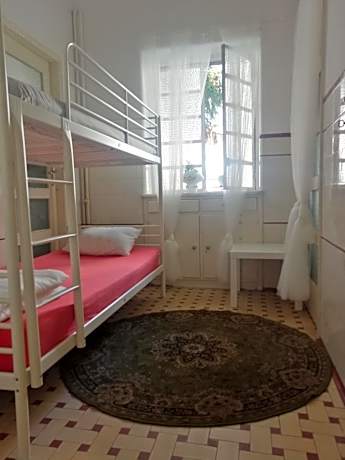 Single Bed in Female Dormitory Room
