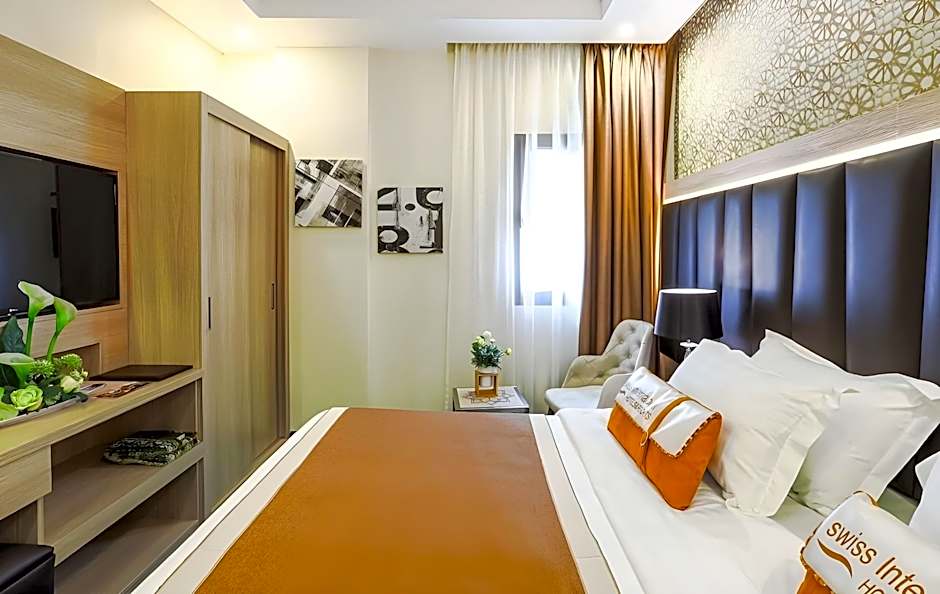 Swiss international Al Madina