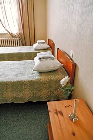 Single Bed in Dormitory Room