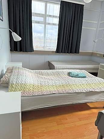 Basic Triple Room with Shared Bathroom