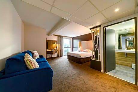 Quadruple Room with One Double Bed and One Sofa Bed