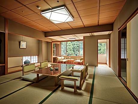 Japanese-Style Room With River and Forest View