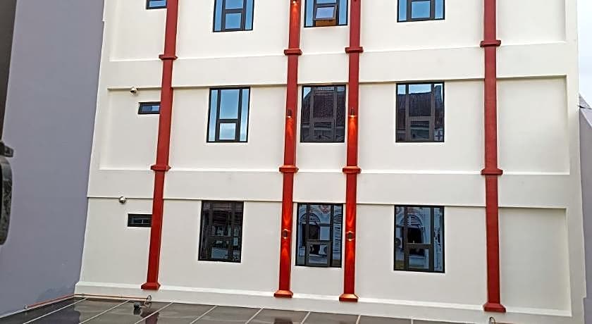 Capital O 90897 Island City Hotel