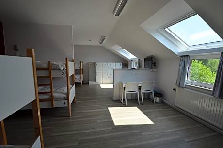 Single Bed in Female Dormitory Room with Shared Bathroom