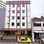 Capital O 90897 Island City Hotel