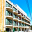 Olivia Palm Hotel