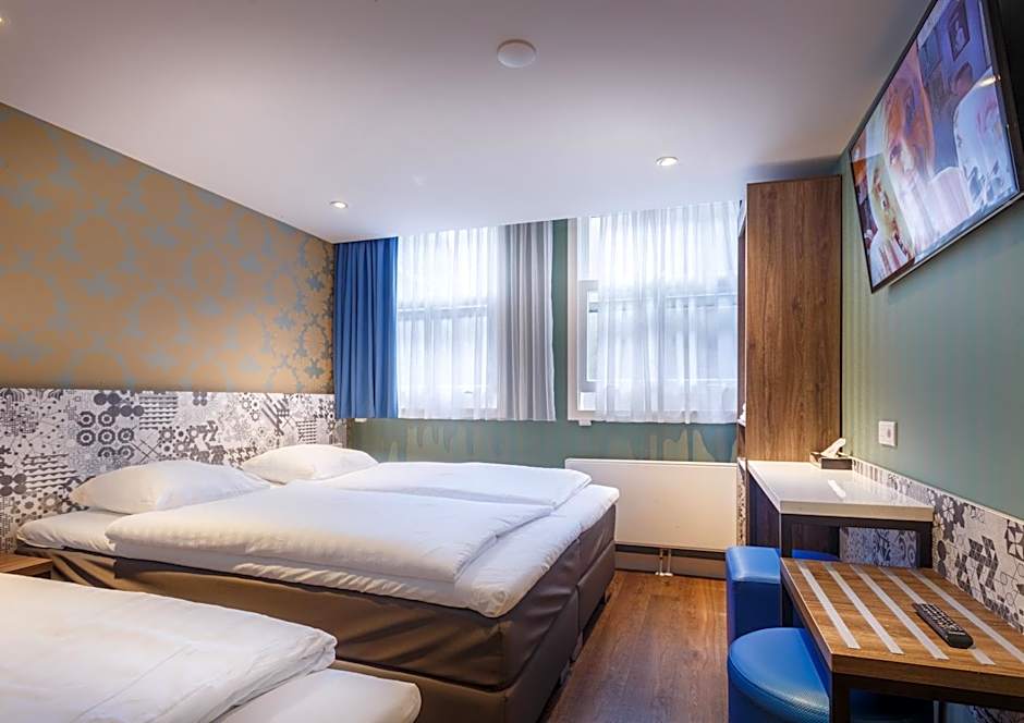 Photo 1 of 6 of Triple Room with Private Bathroom
