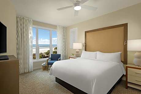 Two-Bedroom Oceanfront Villa with One King Bed, Two Twin Beds, Sofa Bed and Balcony
