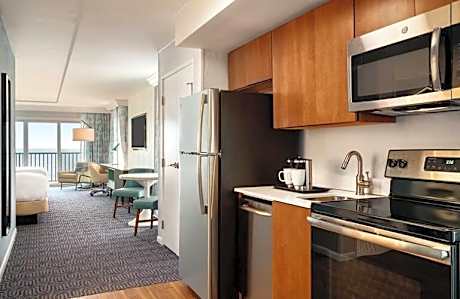 Corner Room, Double Queen with Kitchen, Balcony, and Oceanfront View