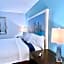 Bluebird Day Inn & Suites