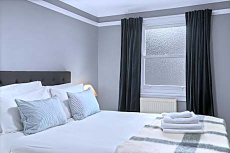 Queen Room with Shared Bathroom