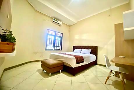 OYO 93838 Delia Inn Syariah