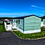 LOVELY BRIGHT MODERN CARAVAN SWANAGE on PEACEFUL AND TRANQUIL HOLIDAY PARK