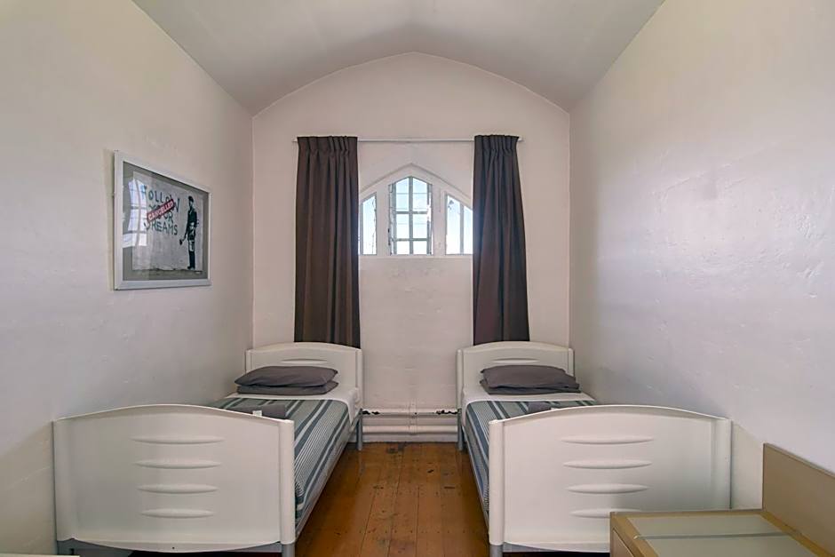 Photo 1 of 11 of Standard Twin Room with Shared Bathroom