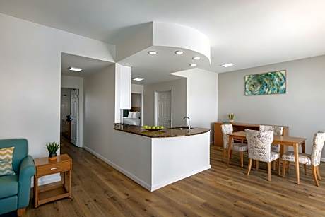 Two-Bedroom Penthouse Suite with One King Bed & Two Double Beds, Kitchen, & Living Room - Non Smoking